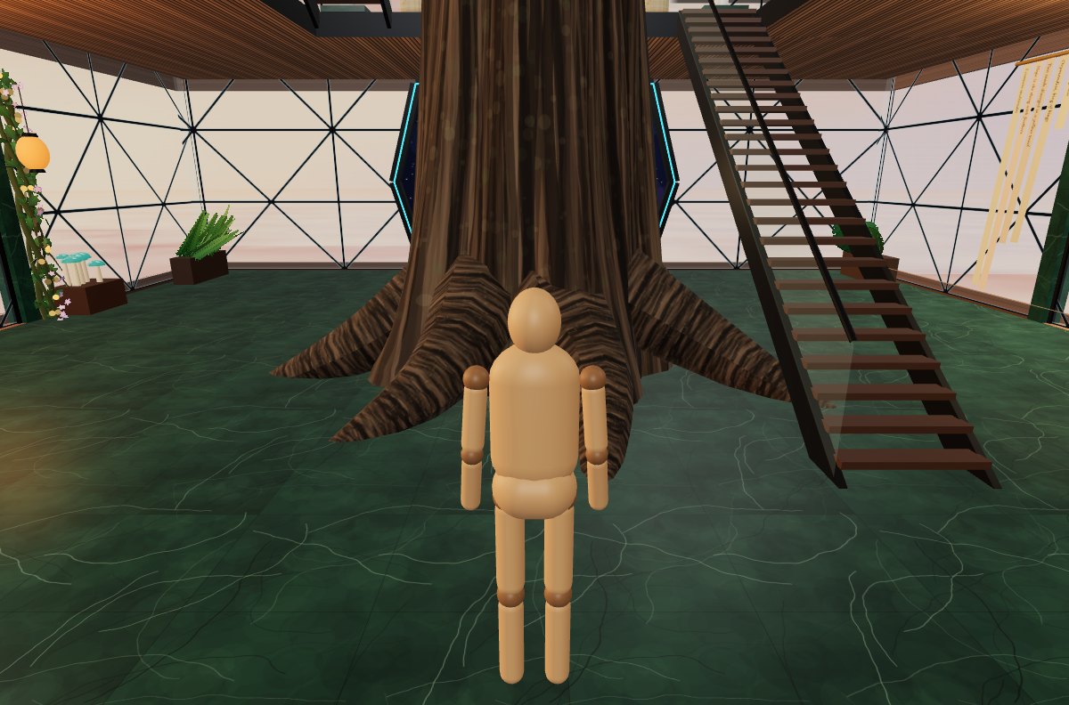 The lobby of the Grand Library, at the roots of a great tree, with a staircase climbing up